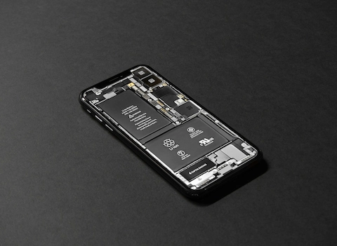 Photo of a partially disassembled cell phone on a table